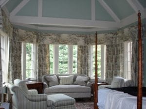 Patterned drapes in the bay window of a bedroom, the fabric house, buy fabric online, custom window treatments, fabric store, decorator fabric.