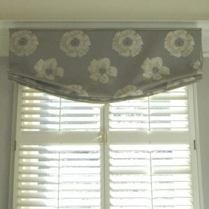 Close up of flowered valance on a window, the fabric house, custom window treatments, fabric online, fabric store.