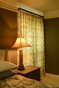 Patterned drapes in a bedroom near nightstand, the fabric store, upholstery fabric, custom window treatments, fabric online