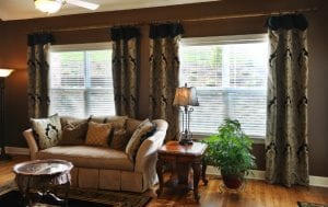 Living room drapes with dark ornate pattern, the fabric house, custom window treatments, buy fabric online, designer fabric